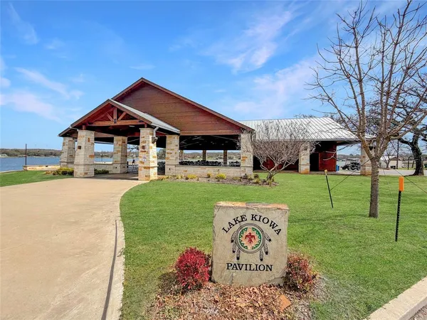 a view of a big room with table and chairs