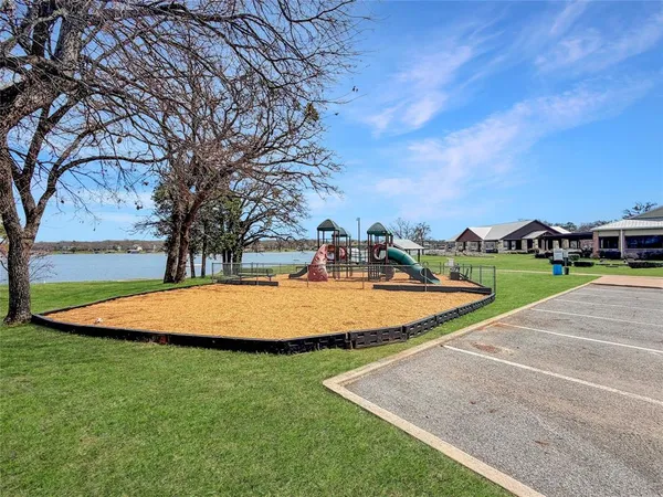 a view of a tiny house with a yard