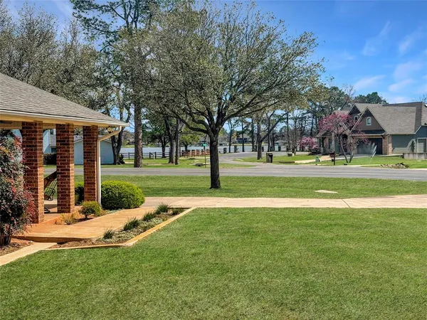 a view of a building with a yard