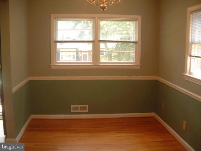 2603 Loma Street Silver Spring, MD 20902 - Photo 4 of 12 Separate dining room with chair railing.