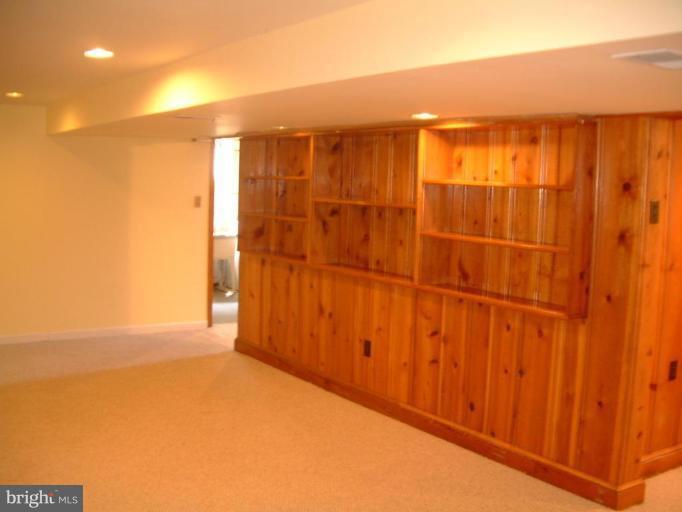2603 Loma Street Silver Spring, MD 20902 - Photo 6 of 12 Large recreation room w/built-in bookcases.