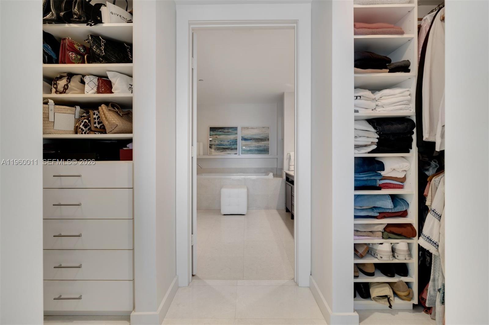 465 Brickell Avenue, Unit 2703 Miami, FL 33131 - Photo 14 of 40 a view of a walk in closet