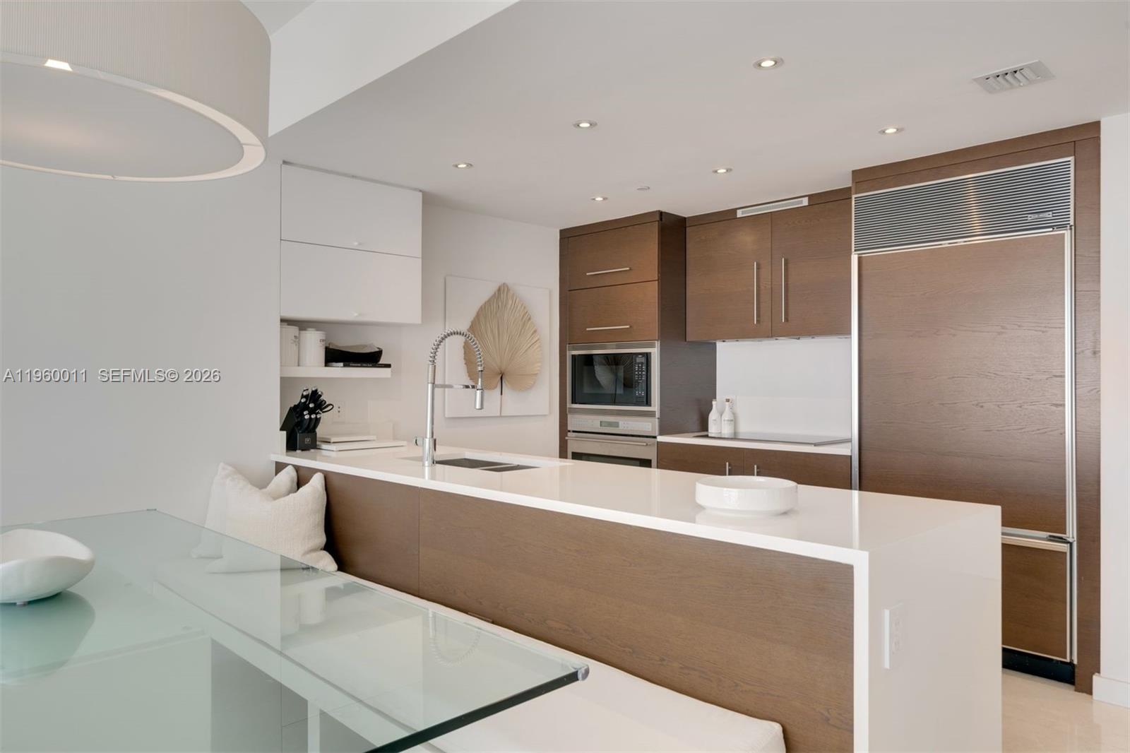 465 Brickell Avenue, Unit 2703 Miami, FL 33131 - Photo 8 of 40 a bathroom with a tub sink and toilet