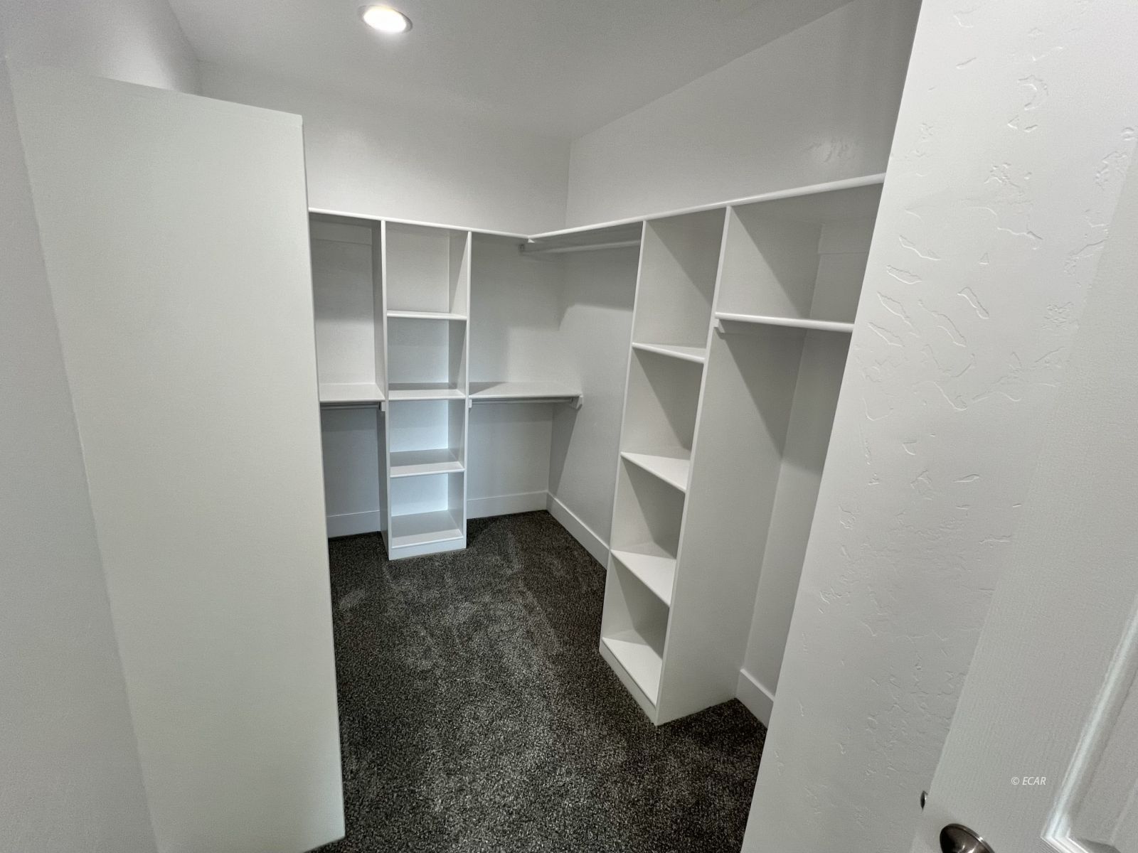 1096 Sun Vly Road Spring Creek, NV 89815 - Photo 22 of 31 a view of walk in closet with empty racks