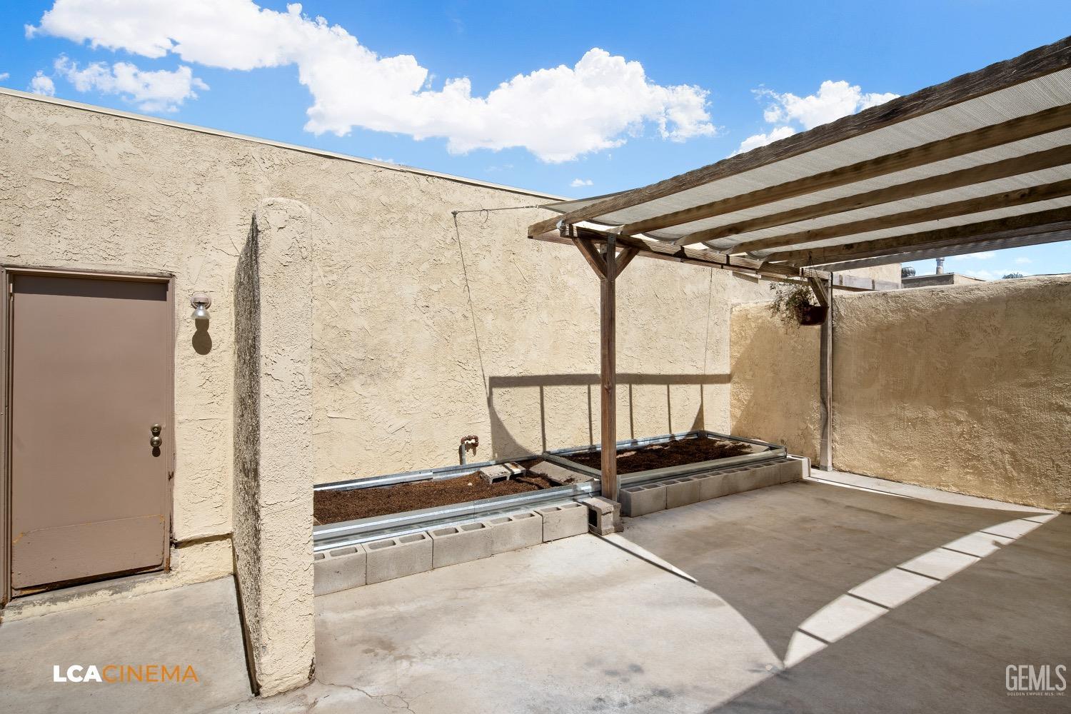 Undisclosed Address Bakersfield, CA 93308 - Photo 15 of 20 a view of a room with gym equipment