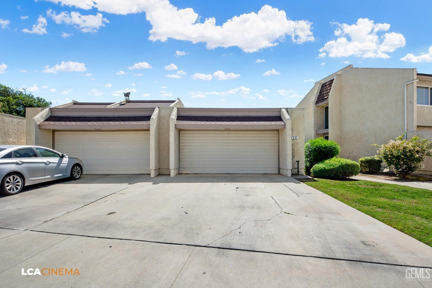 Undisclosed Address Bakersfield, CA 93308 - Photo 20 of 20 a view of parking space and a yard