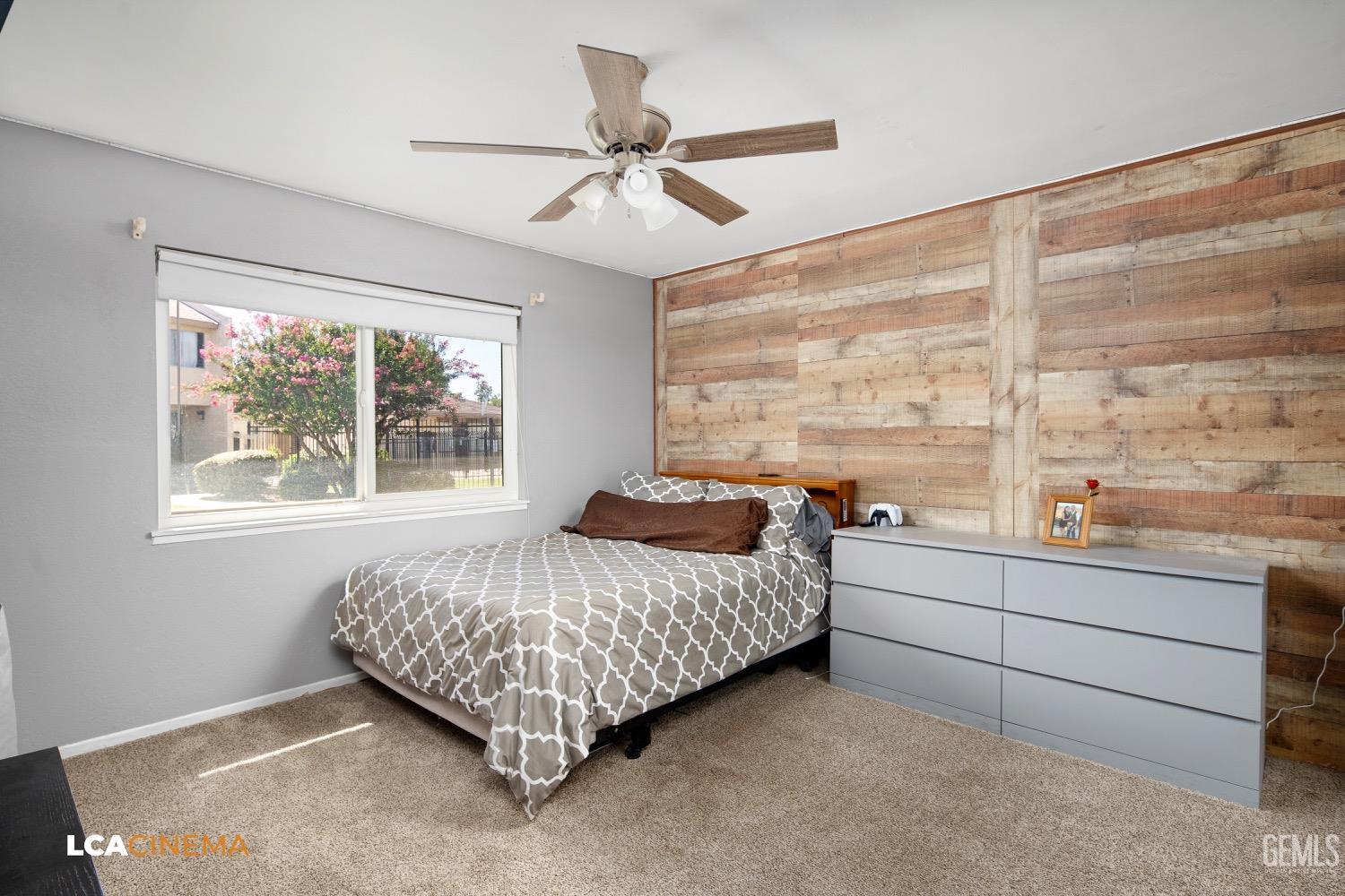 Undisclosed Address Bakersfield, CA 93308 - Photo 10 of 20 a bedroom with a bed and window