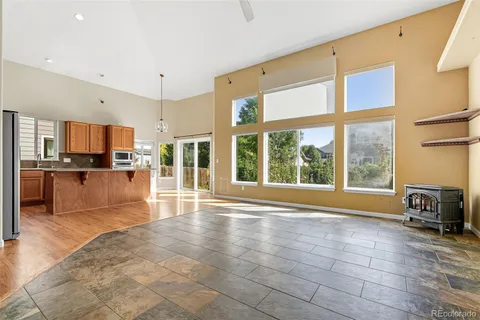 a view of a kitchen with furniture and a window