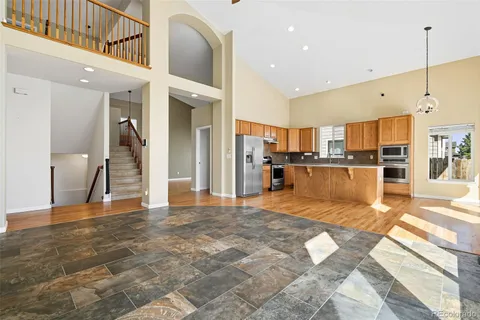 a view of a living room with a large window