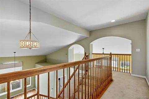 a view of staircase with a projector