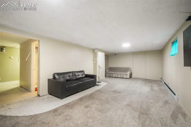 a living room with furniture and a couch