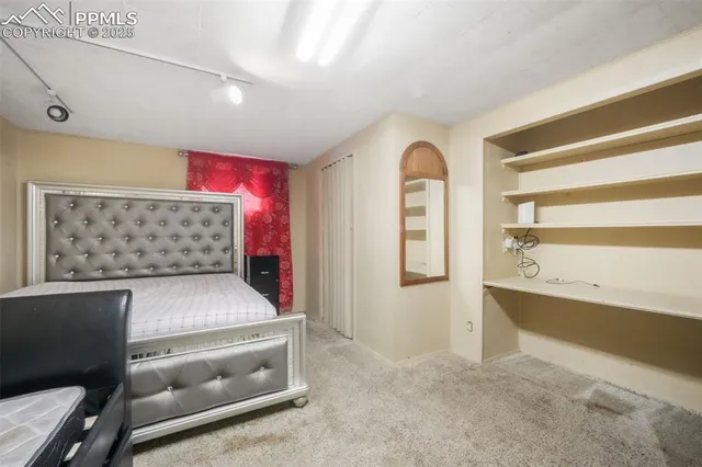 a view of a chairs with table in a patio