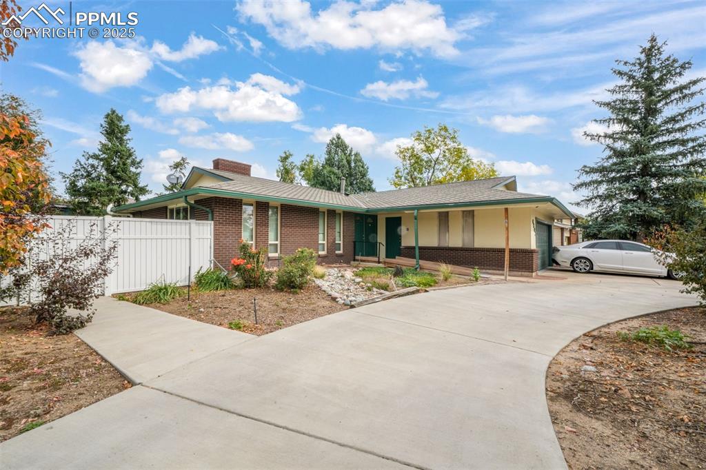 6802 Galley Road Colorado Springs, CO 80915 - Photo 41 of 50 a view of a house with a patio