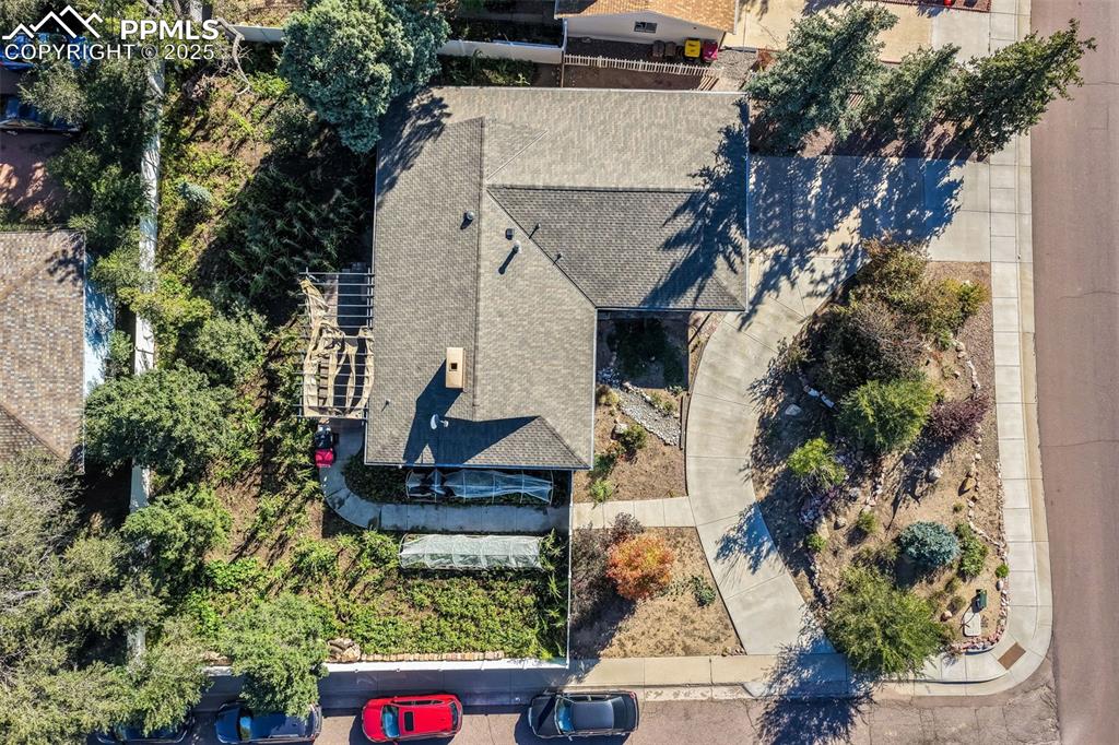 6802 Galley Road Colorado Springs, CO 80915 - Photo 44 of 50 an aerial view of a house with a yard and fountain