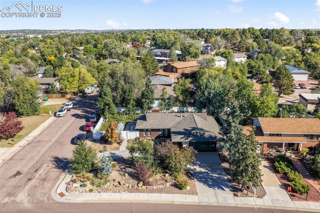 6802 Galley Road Colorado Springs, CO 80915 - Photo 49 of 50 an aerial view of a house with a yard