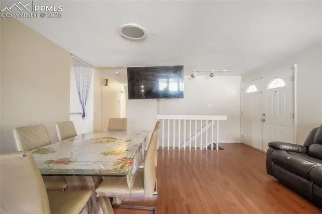 a view of a livingroom with furniture and wooden floor