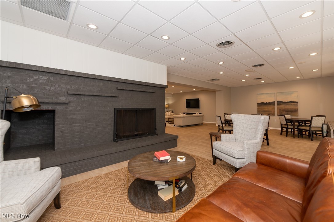 2365 Covington Road, Unit 221 Akron, OH 44313 - Photo 42 of 50 View from seating and fireplace to the tables and chairs