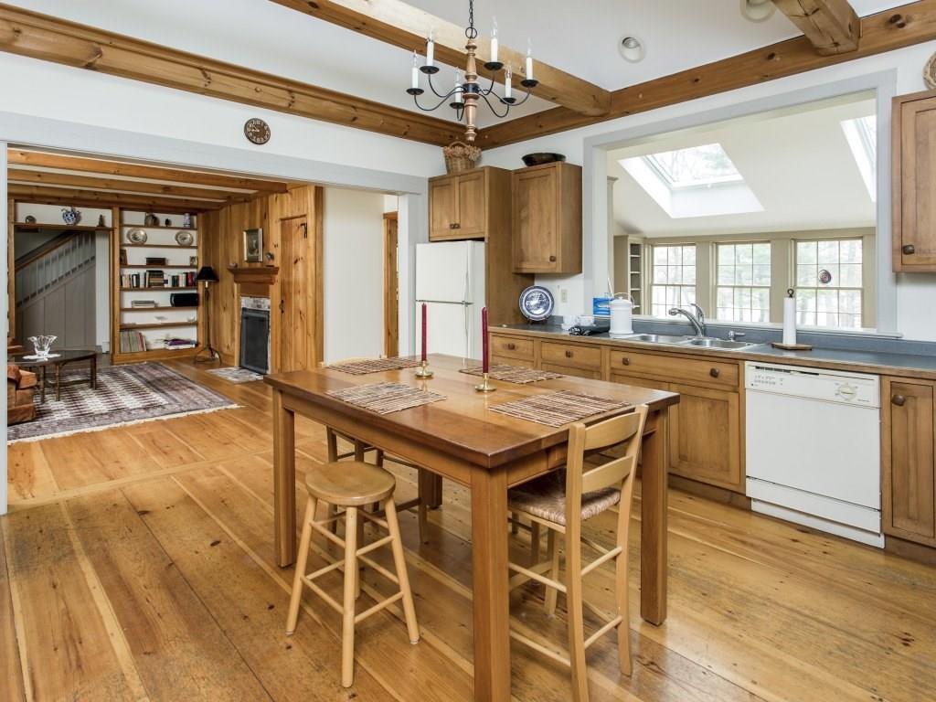 187 Mills Road Newcastle, ME 04553 - Photo 6 of 34 Authentic beams accent the open space.