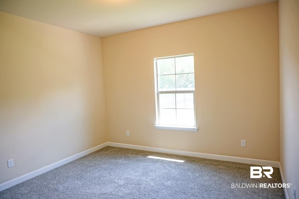 593 Begeman Road Mobile, AL 36608 - Photo 19 of 23 Spare room featuring carpet