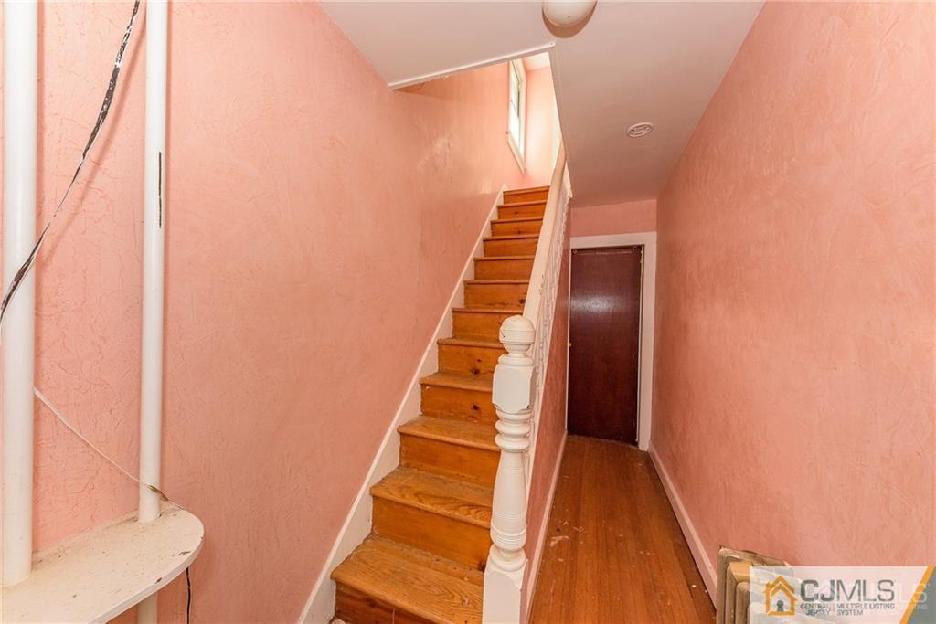 86 Main Street Matawan, NJ 07747 - Photo 12 of 25 a view of entryway with wooden floor