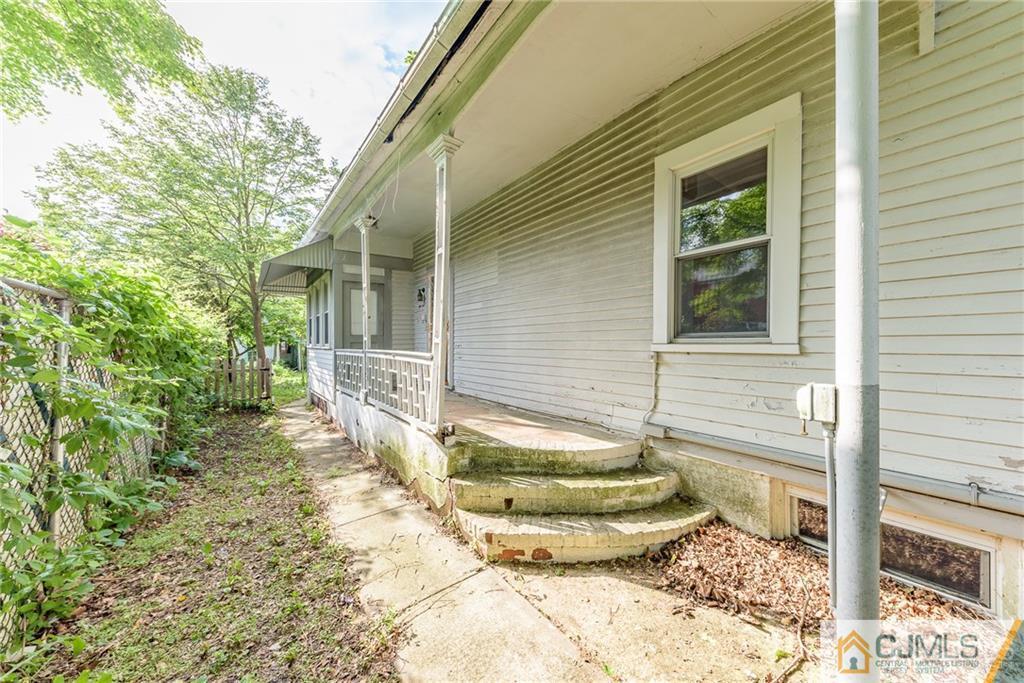 86 Main Street Matawan, NJ 07747 - Photo 24 of 25 a view of a small house with roof
