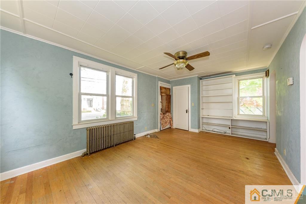 86 Main Street Matawan, NJ 07747 - Photo 3 of 25 a view of an empty room with a window