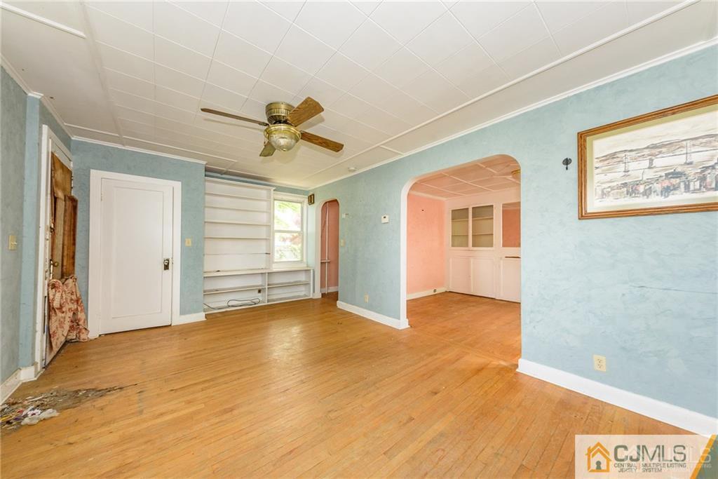 86 Main Street Matawan, NJ 07747 - Photo 4 of 25 a view of an empty room with a window
