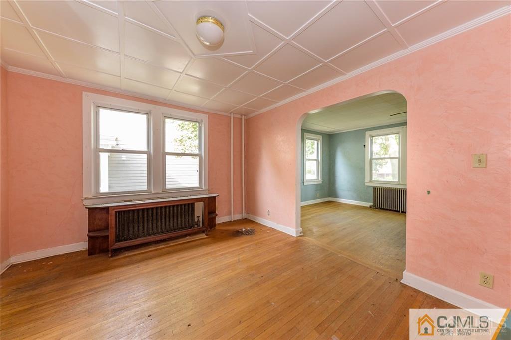 86 Main Street Matawan, NJ 07747 - Photo 5 of 25 an empty room with windows