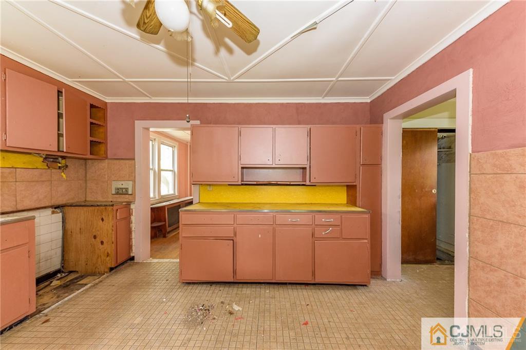 86 Main Street Matawan, NJ 07747 - Photo 8 of 25 a bathroom with a tub and view of bathroom