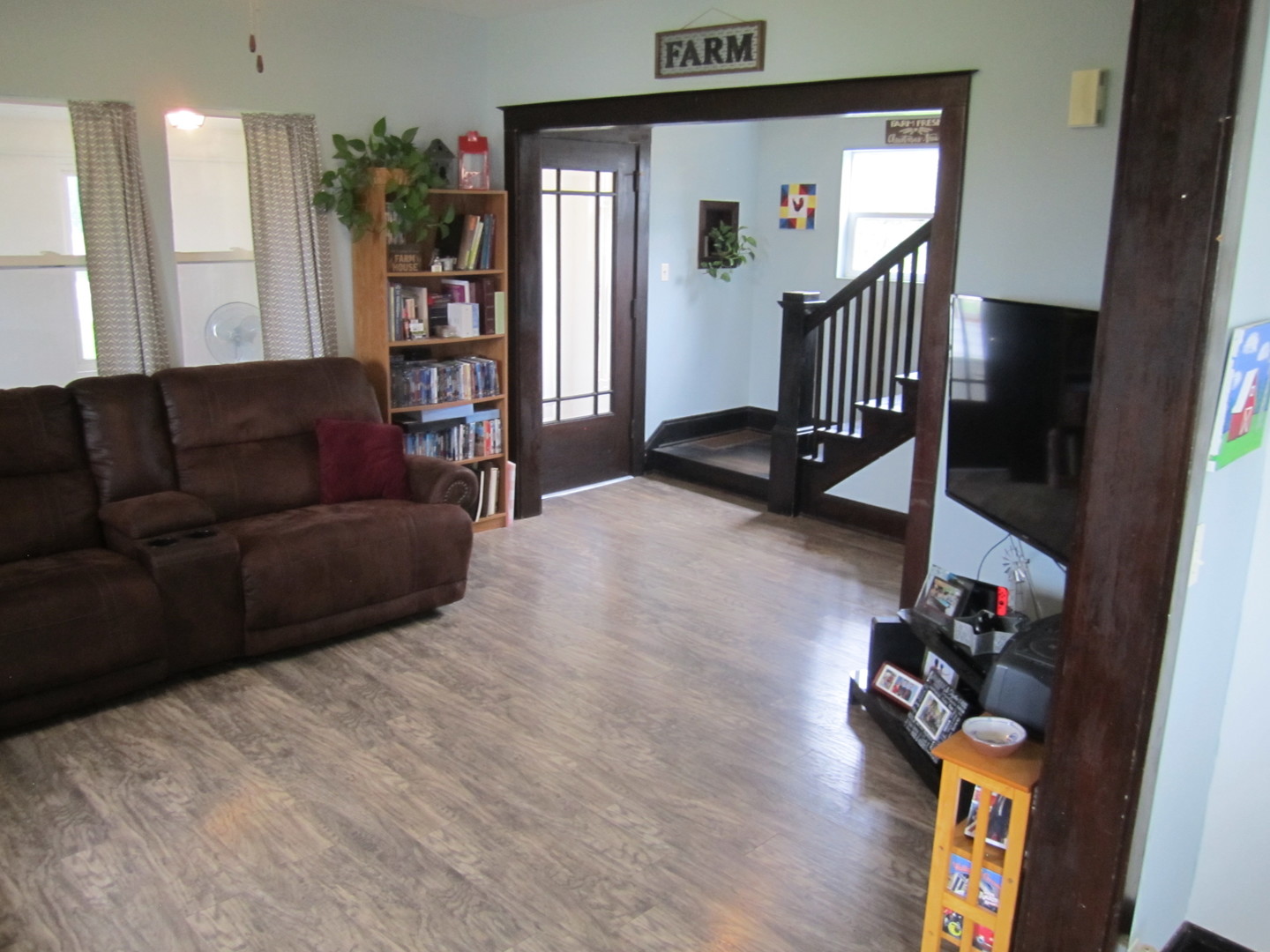 5668 And 5708 State Route Malta, IL 60150 - Photo 14 of 37 a living room with furniture and a flat screen tv
