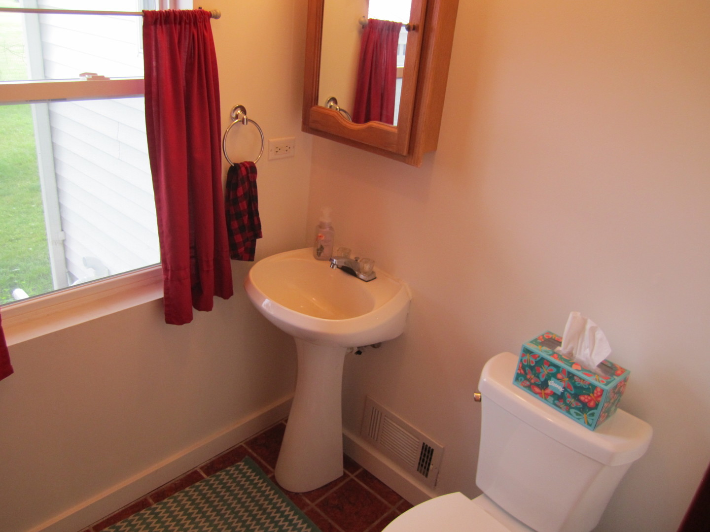 5668 And 5708 State Route Malta, IL 60150 - Photo 16 of 37 a bathroom with a sink and a toilet