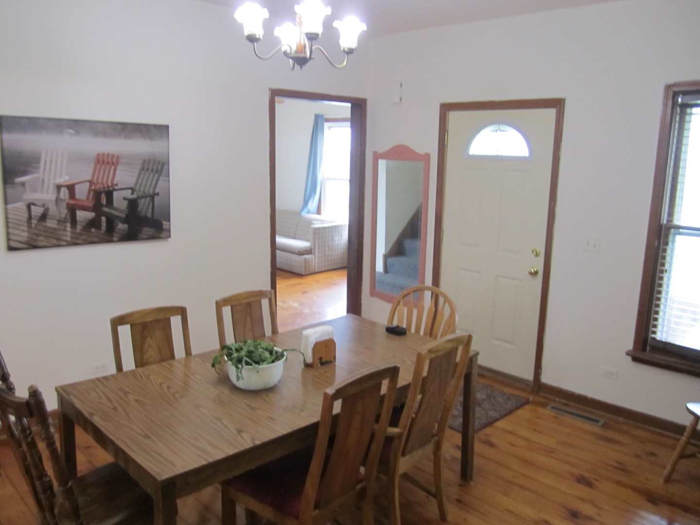5668 And 5708 State Route Malta, IL 60150 - Photo 28 of 37 a view of a dining room with furniture and wooden floor