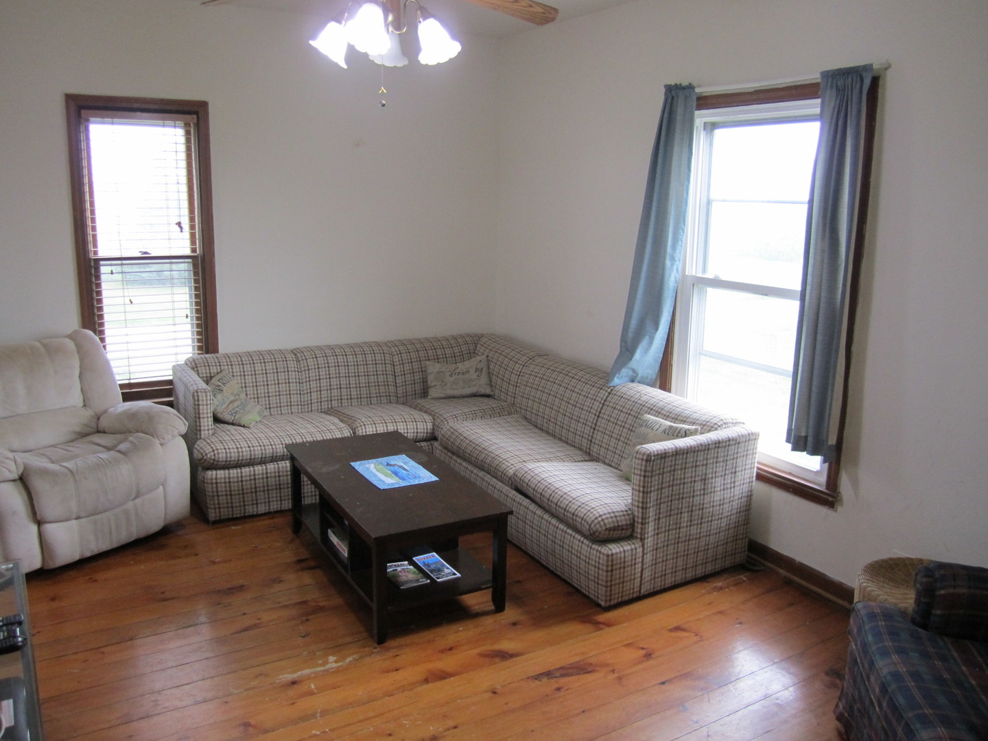 5668 And 5708 State Route Malta, IL 60150 - Photo 29 of 37 a living room with furniture and a window