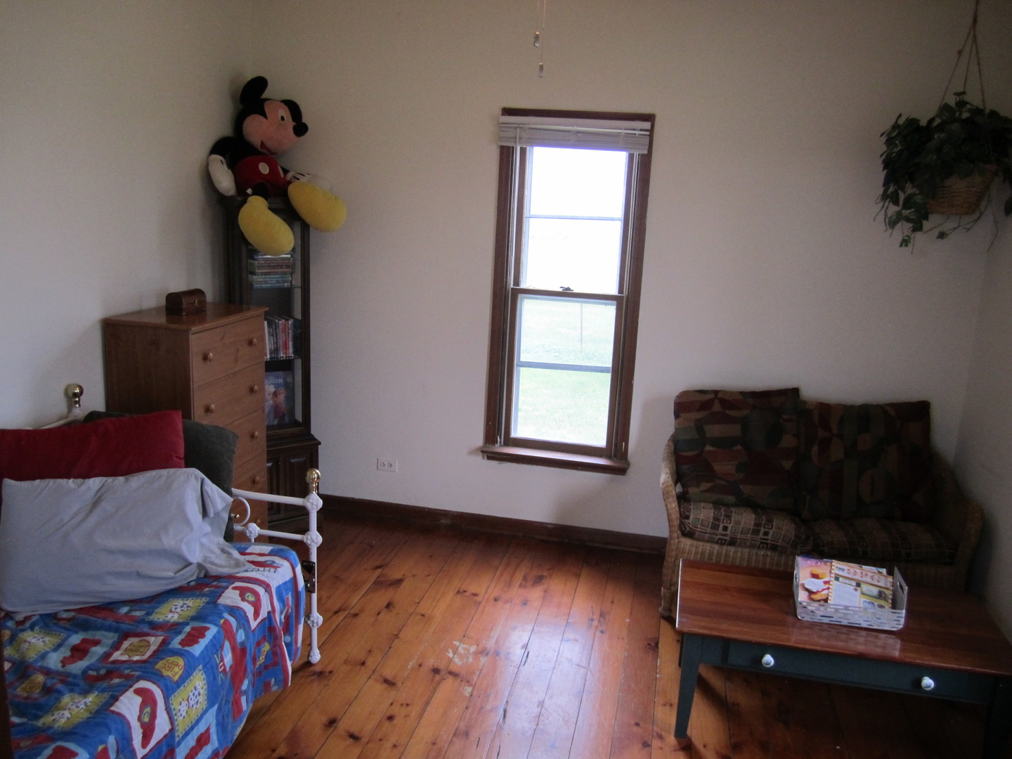 5668 And 5708 State Route Malta, IL 60150 - Photo 30 of 37 a bedroom with a bed and wooden floor