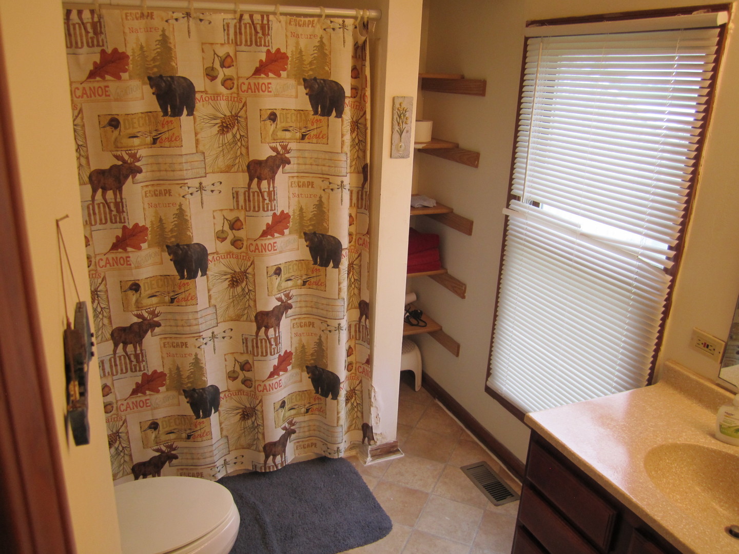 5668 And 5708 State Route Malta, IL 60150 - Photo 31 of 37 a bathroom with a sink and toilet