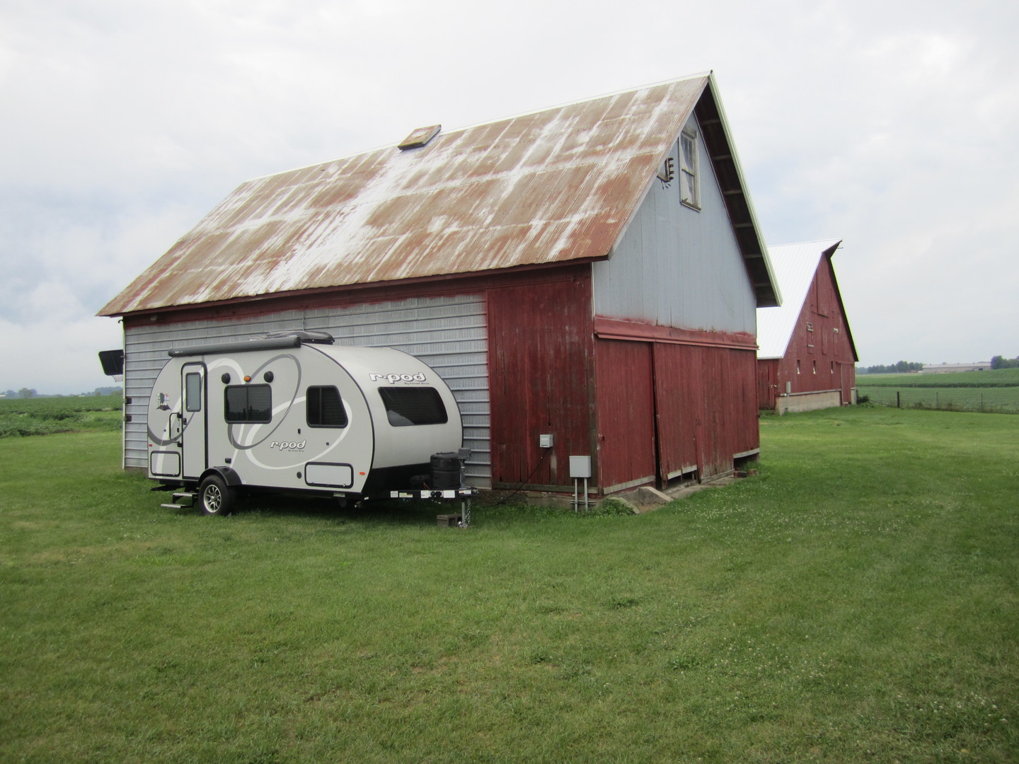 5668 And 5708 State Route Malta, IL 60150 - Photo 5 of 37 a house that is sitting in the grass
