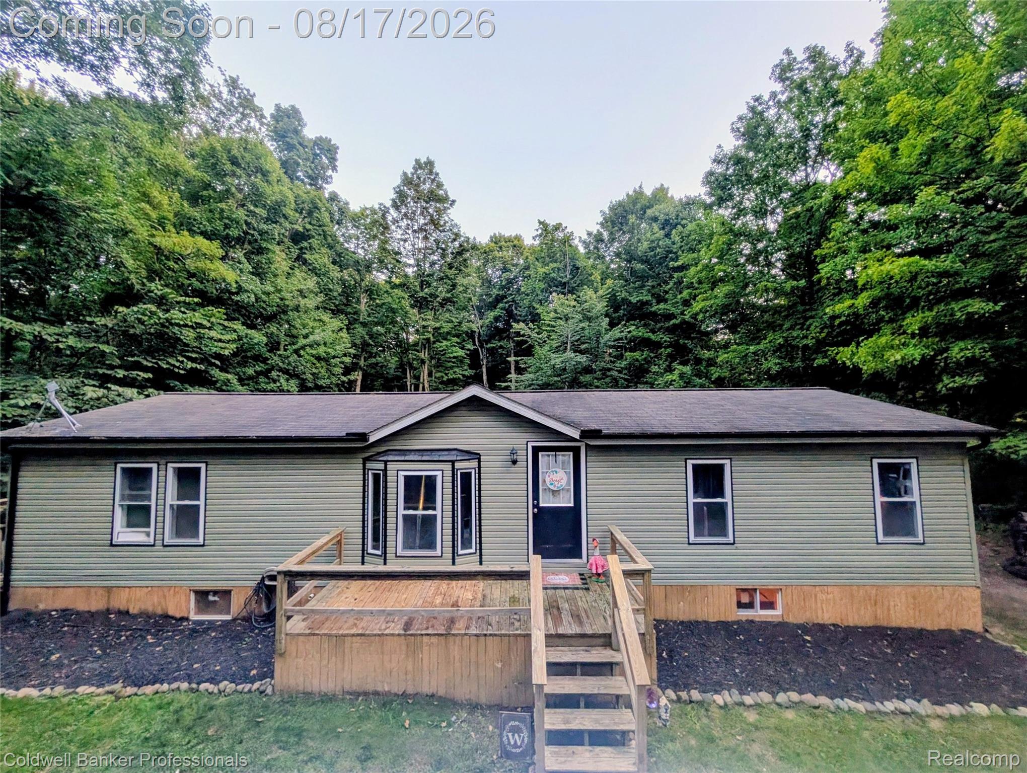 5323 English Road Clifford, MI 48727 - Photo 1 of 46 Ranch-style residence featuring horizontal siding and a dark shingle roof
