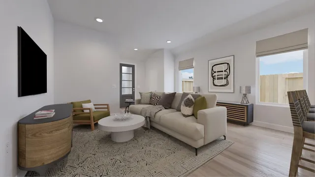 a picture of a living room with furniture