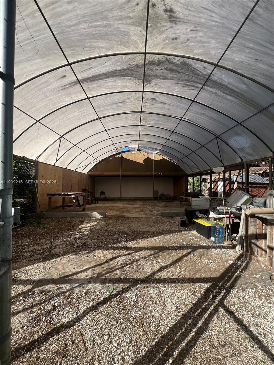17540 Southwest 254th Street Homestead, FL 33031 - Photo 18 of 85 a view of a backyard of a house