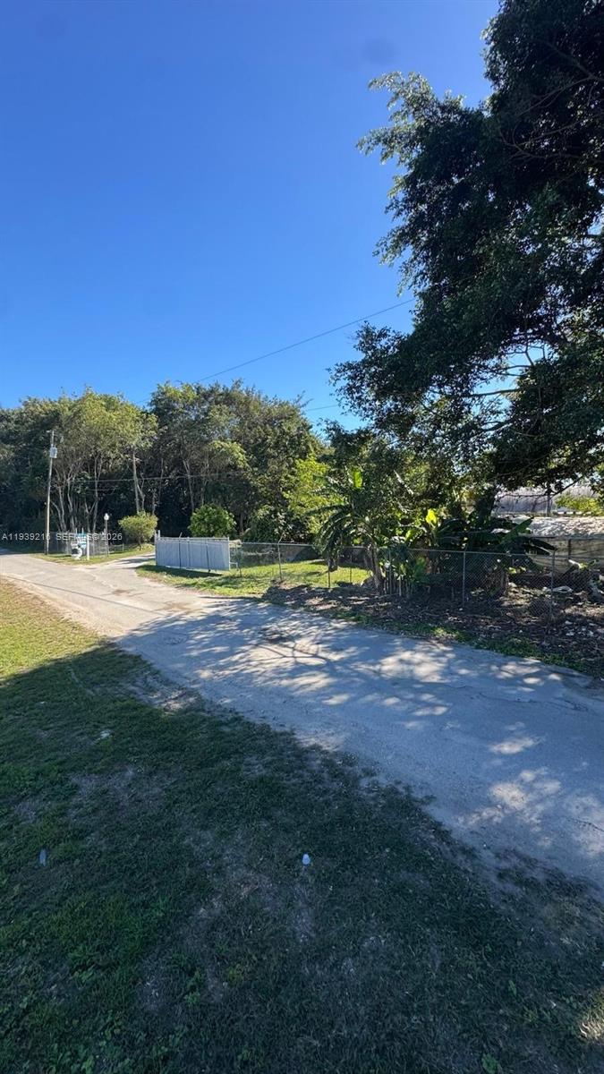 17540 Southwest 254th Street Homestead, FL 33031 - Photo 21 of 85 a view of outdoor space with a yard