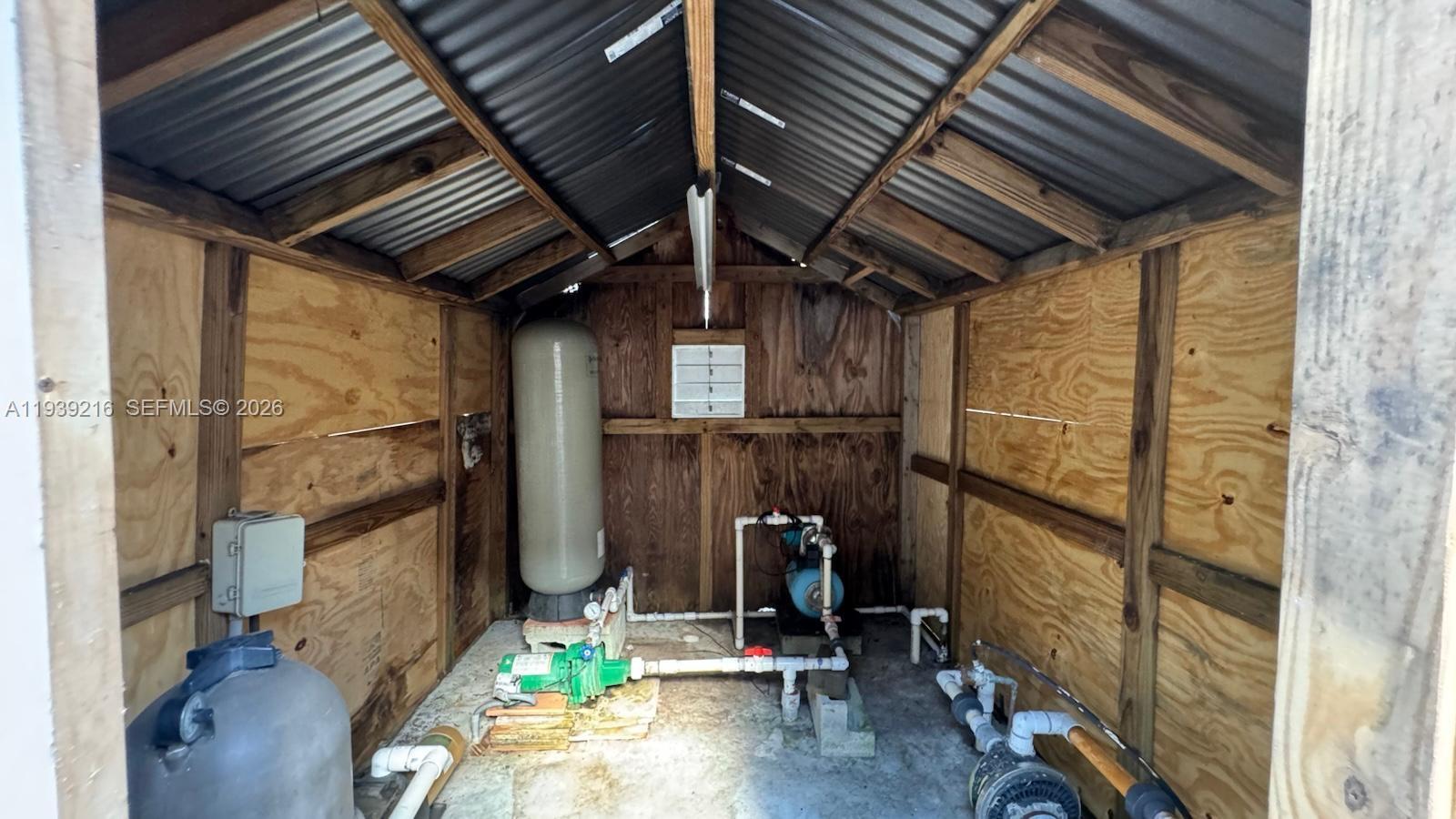 17540 Southwest 254th Street Homestead, FL 33031 - Photo 32 of 85 a view of a room with gym equipment