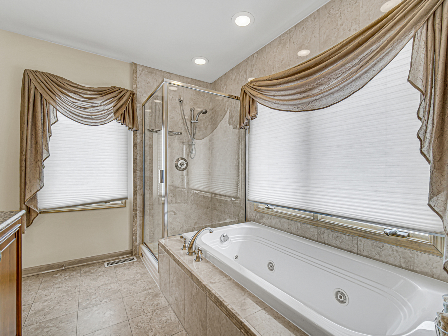 631 Riverside Drive Park Ridge, IL 60068 - Photo 15 of 31 a bathroom with a bathtub and a shower