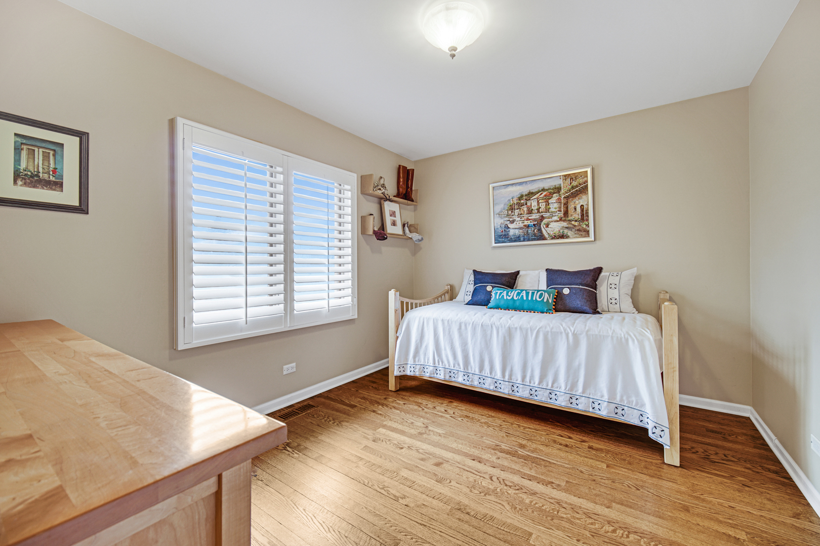 631 Riverside Drive Park Ridge, IL 60068 - Photo 20 of 31 a bedroom with a bed and wooden floor