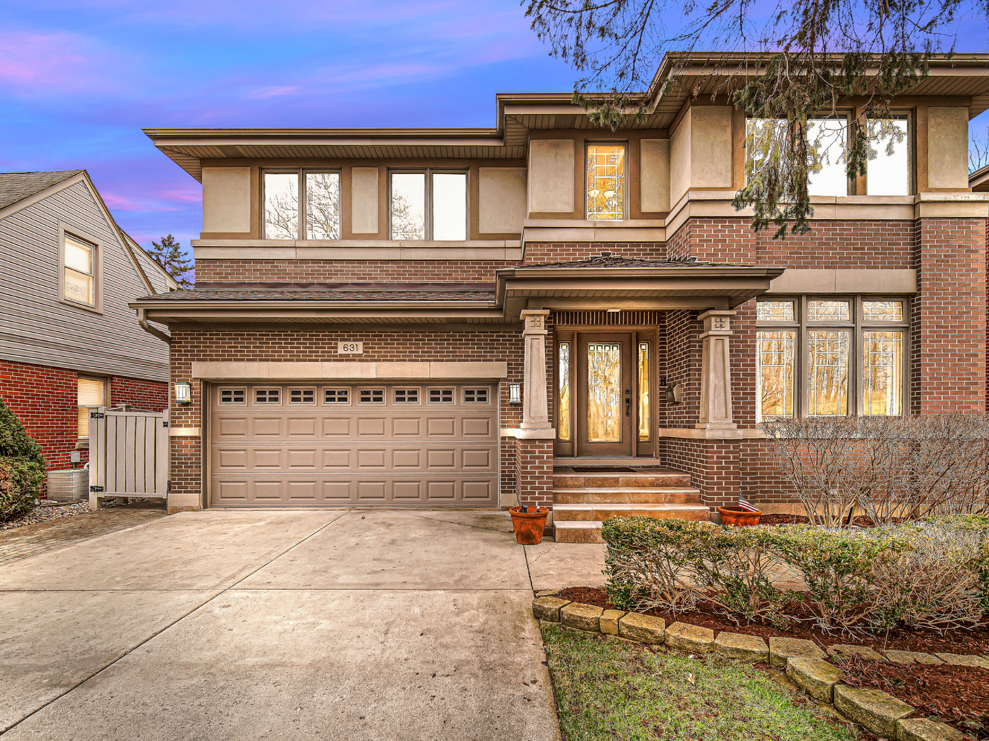 631 Riverside Drive Park Ridge, IL 60068 - Photo 2 of 31 a front view of a house with a garden