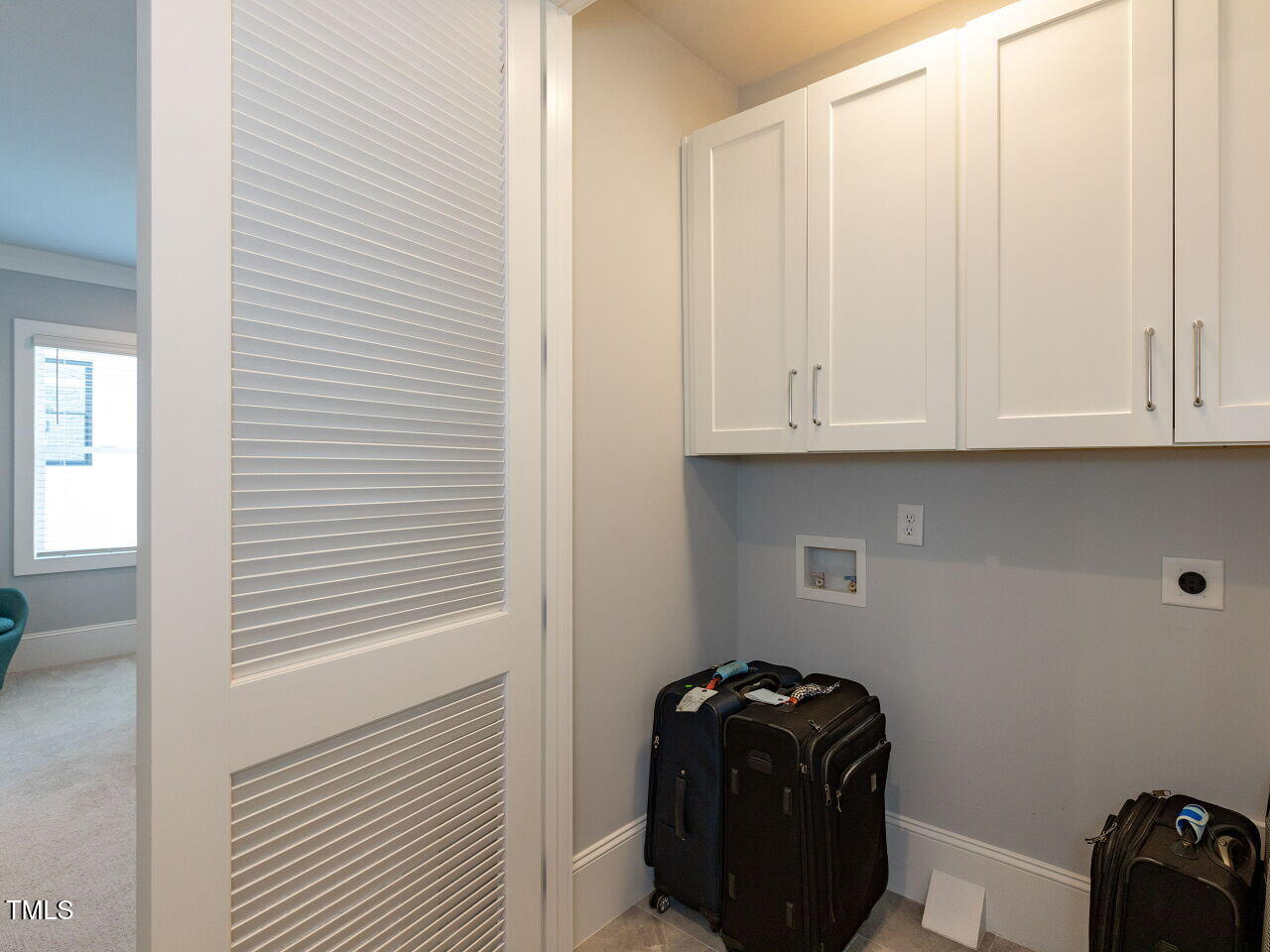 3416 Edgemont Drive Raleigh, NC 27612 - Photo 32 of 49 Second floor laundry room