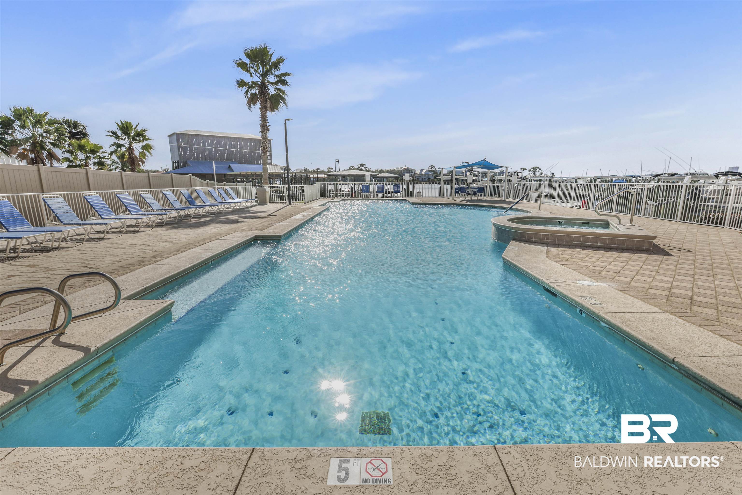 28250 Canal Road, Unit 106 Orange Beach, AL 36561 - Photo 33 of 50 View of swimming pool featuring a pool with connected hot tub