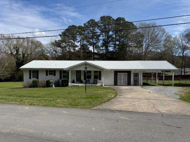 45 Plainview Street Rockmart, GA 30153 - Photo 1 of 24 a front view of a house with a garden