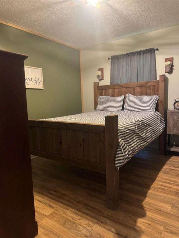 45 Plainview Street Rockmart, GA 30153 - Photo 11 of 24 a bedroom with double bed and a window