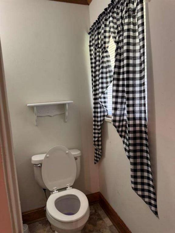 45 Plainview Street Rockmart, GA 30153 - Photo 17 of 24 a bathroom with a toilet and a shower