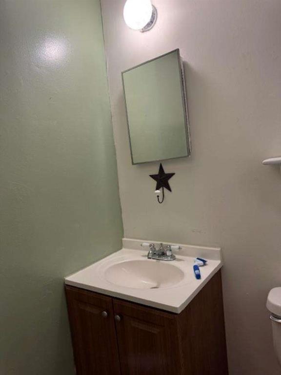 45 Plainview Street Rockmart, GA 30153 - Photo 18 of 24 a bathroom with a sink toilet and mirror